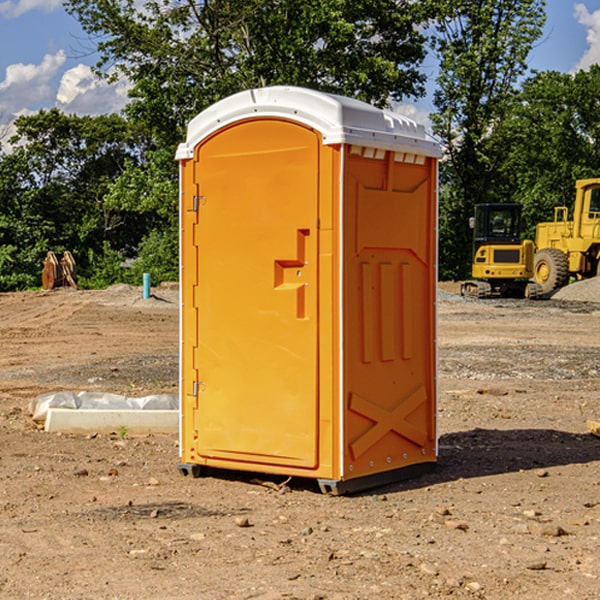 how often are the portable restrooms cleaned and serviced during a rental period in Newbury NH